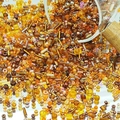 Mixed warm tone DIY glass seed beads and bugle beads spilling from a glass jar - Brown (M761)