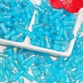 Macro detail of light blue bamboo-shaped glass beads with gold painted textures for DIY jewelry - J56 Brushed Jade Style Bamboo Blue