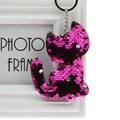 Pink sequin cat keychain with silver metal ring hanging on a white photo frame - Cat (Rose Red)