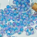 Dettaglio macro di perline di vetro sfumate blu e viola 8-10mm con fili dorati - Viola Blu (H211)
