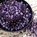 Macro detail of 10mm purple crackle glass beads with gold veins for DIY jewelry - Two-Tone Crackle Style (H212) / 8mm / Purple Fairy