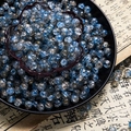 Macro shot of 10mm blue cracked glass beads with silver foil on Chinese calligraphy paper - Two-Tone Crackle Style (H213) / 8mm / Firmament