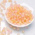 Detail of 10mm pink and yellow gradient crackle glass beads in a white ceramic dish - Yellow Pink Style(H33)