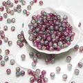 Detailed macro view of 10mm cracked glass beads with pink and green marble texture - Pink Blue Style(H121) / 10mm