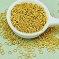 Macro view of polished gold-plated jump rings for DIY jewelry making and linking - P31# Sand Gold Closed Jump Ring / 0.7x5mm