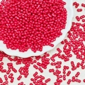 Vibrant red peanut glass seed beads with dual holes for handmade jewelry making and DIY projects - Dark Red
