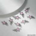 Macro view of silver meteor star charms with pink gems and rhinestone details - Light Pink Star Style (G163)