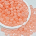 Rosa durchscheinende Glasperlen in einer weißen Schale für DIY Schmuckherstellung - 8mm / Chalcedon (E57#) / Pfirsich