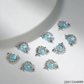 Vista detallada de dijes de corazón y flecha plateados con piedras azules para joyas DIY - Estilo Corazón Flechado (G137) / Naranja Azul