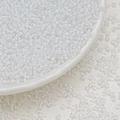 Close-up of 3mm transparent white glass seed beads for DIY jewelry making and tassels - 10 g / White (3mm)
