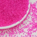 Macro shot of 3mm rose pink glass seed beads for DIY jewelry making in a white bowl - Rose Red (3mm)