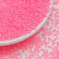 Macro shot of 3mm neon pink glass seed beads for DIY jewelry and earring making - Medium Pink (3mm)