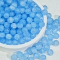 Polished sea blue glass beads 8-10mm for DIY jewelry making in a white ceramic dish - 8mm / Light Blue Shattered Jade Look