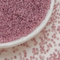 Macro view of translucent 3mm pink-purple glass seed beads for DIY jewelry craft - Purple Red (3mm)