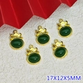 Detailed macro view of 5 green glass alloy pendants with gold crown bail, 17x12x5mm size - Green Style (B661)