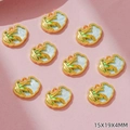Detail showing nine gold-plated cloud pendants with palm tree motifs on pink surface - Blue