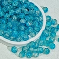 Polished lake blue crackle glass round beads for jewelry making displayed in a tray - 10mm / Blue Crackle