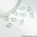 Makroaufnahme von 27x15x6mm grünen Tropfenanhängern mit Silberrahmen und Kristallen - Tröpfchen-Edelstein Anhänger (G145)