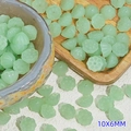 Macro shot of 10x6mm light green lotus seed pod beads for DIY jewelry making - Lotus Pod Style (L919) / Light Green