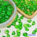 Macro shot of 10x6mm green glass lotus flower beads for DIY jewelry making - Five-Petal Style (L924) / Transparent Green