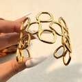 Modern 18K gold plated stainless steel open cuff bracelet with hollow geometric design - Geometric Polygon Hollow Style (SS-YS121-2)