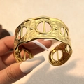 18K gold-plated cuff bracelet featuring a hammered texture and geometric hollow design - Hammered Round Hole Style (SS-YS121-3)