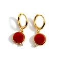 Mode Creolen in Gold mit runden tiefroten Steinen und kleinen Zirkon-Akzenten für Damen - Rot