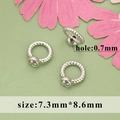 Silver-plated twisted loop pendant with zircon stone and 0.7mm hole for jewelry making - 20 Pieces Set / Silver with Stone (MG1504B)