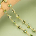 Gold-plated chain necklace with green beaded flower clusters on a wooden display - 1m / C43102 Green Cluster