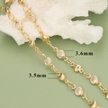 Detailed close-up of 18K gold-plated chain with 3.6mm round cubic zirconia and 3.5mm heart charms - Heart and Round Rhinestone Style (C16001)