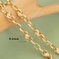Macro view of 18K gold-plated industrial style chain showing 8.6mm link width - 8.6mm Engraved Oval Link Chain Style (C17204) / 1m