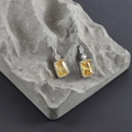 Macro shot of rectangular yellow zircon earrings with silver plated claw setting - Yellow Silver (M99902)