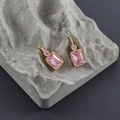 Detail of 18k gold plated earring with rectangular pink zircon on grey stone - Pink Gold (M99908)
