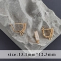 Macro view of 18k gold plated flower petal earring clasps with size markings - Gold Pave Row Style (M104605)