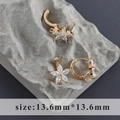 Macro detail of 18k gold plated S925 silver flower earring with marquise cubic zirconia - Gold Marquise Petal Style (M104607)