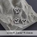Rhodium-plated butterfly charms with cubic zirconia stones, size 9.2mm x 9.6mm - Butterfly Style (M100319)