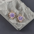 Détail de pendentifs en zircon violet en forme de cœur plaqués or 18 carats sur pierre - Cadre Doré Zirconia Violet (M108509)