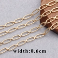 Detailed 18K gold plated O-shaped chain with 0.6cm width and textured spiral finish - Gold Spiral Pattern Oval Link Chain (C14613, 1m)