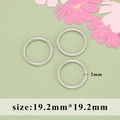 Macro view of three twist-textured silver rings with 19.2mm diameter and 2mm thickness - Woven Braid Pattern (M109705) / 20 Pieces/Pack (19.2mm) / Silver (Rhodium Plated)