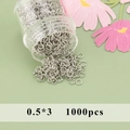 Makroaufnahme von 0,5x3mm rhodinierten silbernen Biegeringen für DIY-Schmuck - 0.5x3mm (20g)