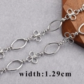 Polished silver metal cross chain with 1.29cm width oval and floral link design - Silver Tone Polished Four-Petal Flower Chain (C14619, 1m)