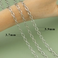 Silver textured diamond cut chain links in 3.7mm and 5.9mm widths on wood - Silver Diamond-Cut Chain (C27706B)