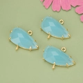 Light blue faceted glass charms with 18k gold plated irregular edging and double loops - Gold-Blue