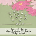 Cuentas espaciadoras facetadas de rodio para joyas DIY, agujero 1,3mm, set 200pcs - Cuenta Redonda Facetada (MB8902B) / 200 Piezas/Paquete (2.4x2.9mm) / Plateado