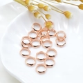 Macro shot of rose gold plated hexagonal spacer beads for DIY jewelry making - 8mm (Inner 6mm) / Rose Gold
