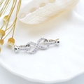 Connettore per gioielli a infinito in argento con zirconi e terminali doppi - Connettore Infinito / Oro Bianco