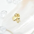 18k gold plated heart and micro-paved boy pendant on iridescent white shell background - Heart Boy