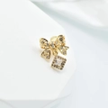 Golden bow pendant with hollow filigree work and square sparkling gemstone detail - With Glue / 14K Gold Color