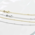 Detail of 18k gold and silver beaded necklaces with lobster clasp and extension chain - 45cm+5cm / Bead-Linked Chain / White Gold