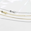Detail of gold and silver box chains with lobster clasps and extension links for DIY necklaces - 45cm+5cm / Box Chain / White Gold